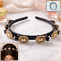 Gold stone studded hairband with luxurious design