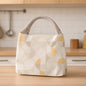 Front view of the Lunchie Bunchie insulated lunch bag, showcasing its secure zip closure.