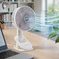 Compact portable USB fan with multifunctional stand for desktop and handheld use