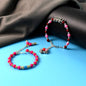 Traditional beaded bracelet showcasing colorful stones and ethnic design