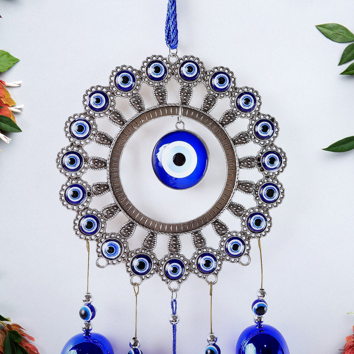 Full view of Om evil eye wind chime with soothing bells