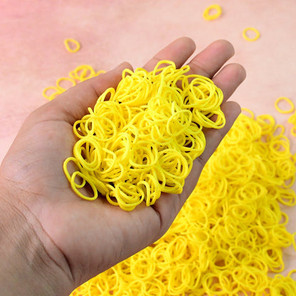 Set of reusable strong elastic rubber bands in orange color