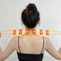 Velvet Wellness handheld back massage roller rope on white background