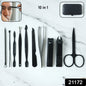 Nail care tools including scissors, nail file, and tweezers for manicure grooming