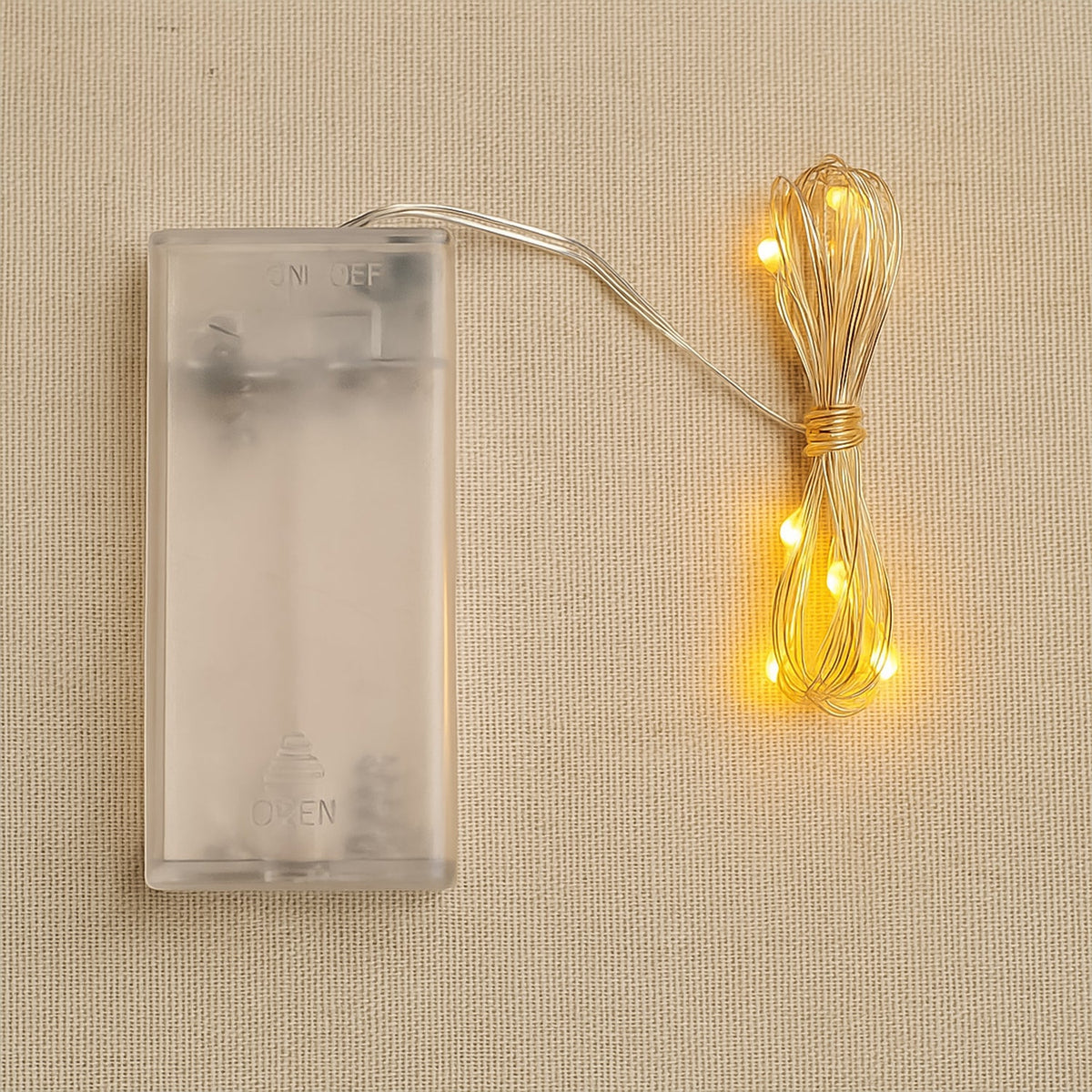 Copper wire string fairy lights with warm white 30 LED bulbs glowing beautifully.