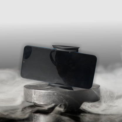 Close-up of a smartphone attached to the anti-fall car phone holder on an air vent.