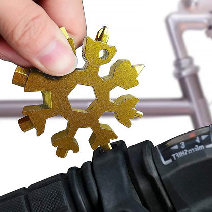 Close-up of the durable stainless steel Snowflake Multi-Tool, highlighting its intricate design.
