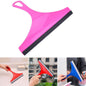 Car mirror wiper in action, clearing water for improved visibility.