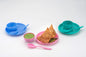Multipurpose snack set with a bowl, dish, and spoon in a vibrant color, ready for use.