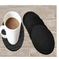Set of 6 round silicone coasters protecting a table from hot beverages.