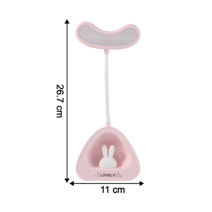 Compact LED desk lamp with flexible neck positioned on office desk