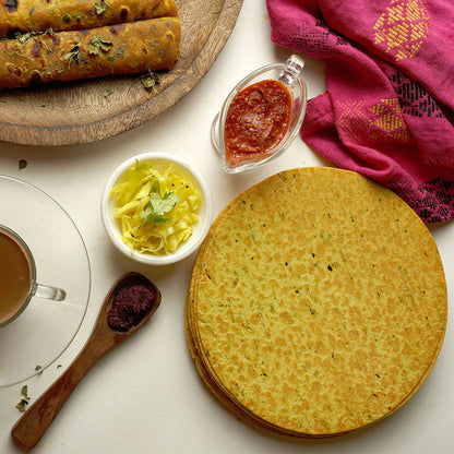 Stack of Maniarr's Masala Khakhras, ready to be enjoyed as a healthy Indian snack.