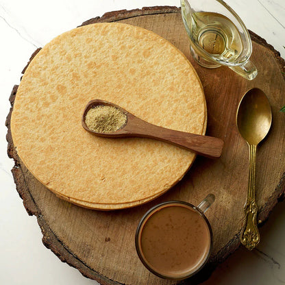 Close-up of a single round Plain Khakhra, showcasing its hand-roasted finish.