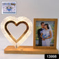 Radiant heart shaped LED lamp showcasing couple's photo