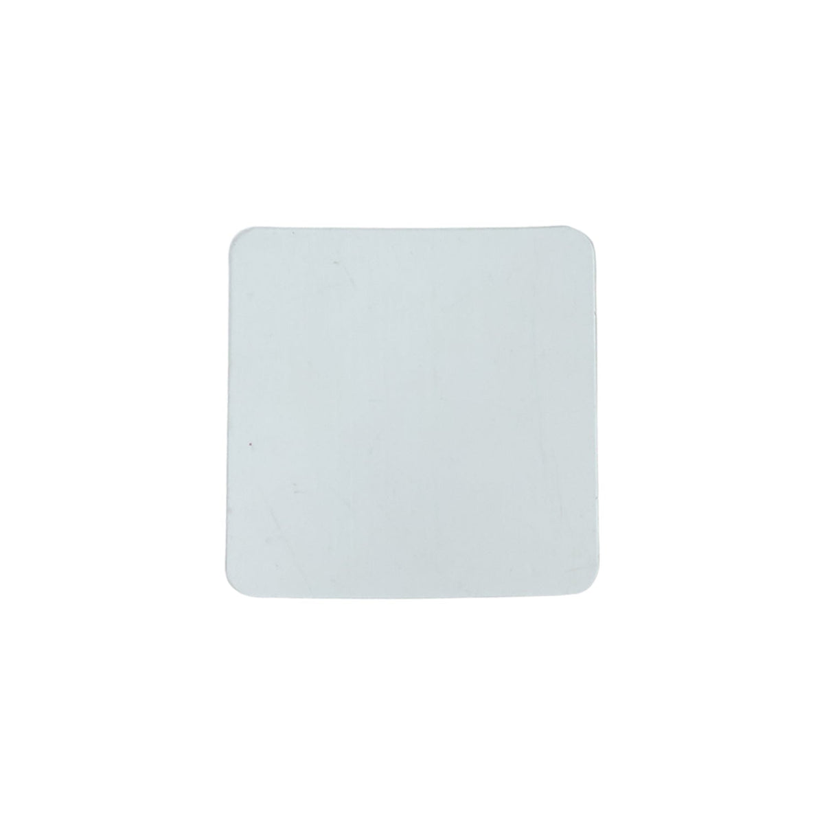 Flat lay of transparent square nano adhesive tape pads