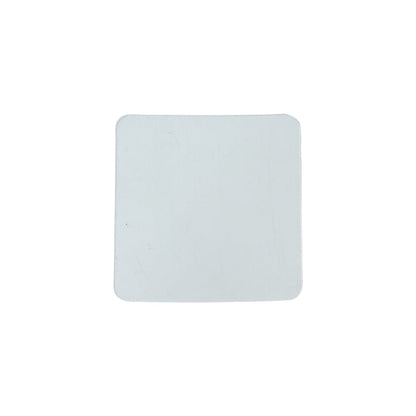 Flat lay of transparent square nano adhesive tape pads