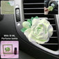 Rose flower car air freshener clip attached to AC vent, freshening air
